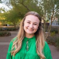 Savannah Ostner smiles at the camera.