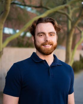 Daniel Chambers smiles at the camera